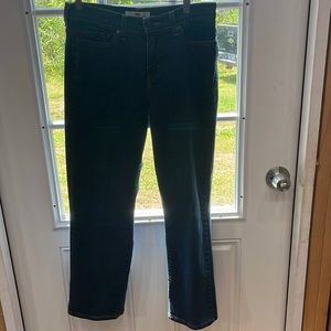 Like new perfectly sliming women’s Levi blue jeans size 10